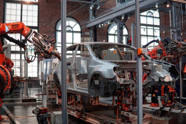 Can AfCFTA help boost local car manufacturing? Car frame in manufacturing plant