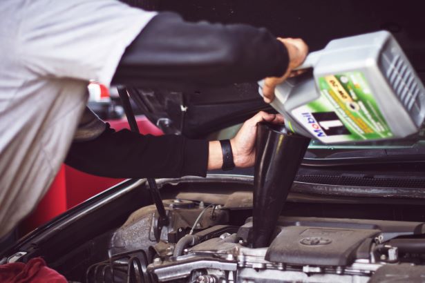 Car Oil Facts Pouring Car Oil