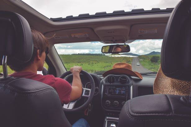 View of people in car from backseat