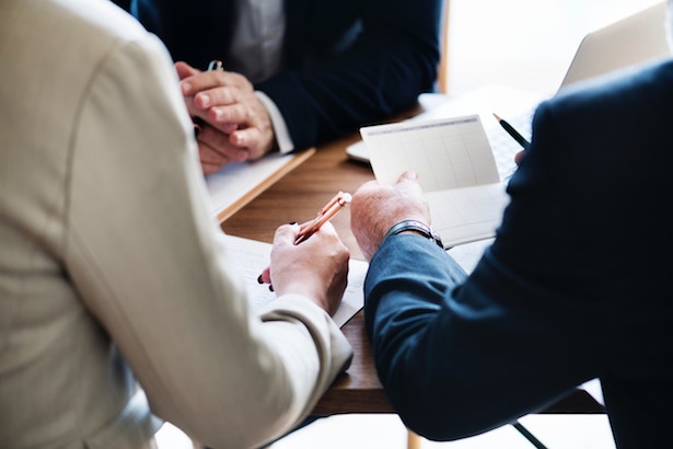 Part 1: SA Car Financing Language Explained People having a discussion about a contract